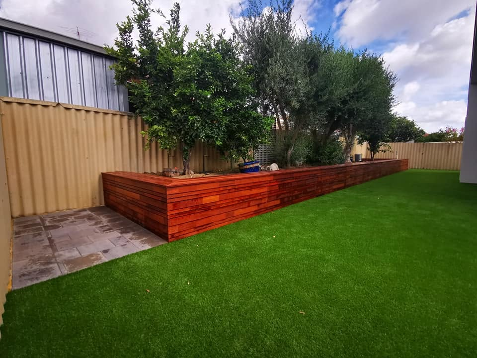 Synthetic turf lawn with merbau planter box, Stirling