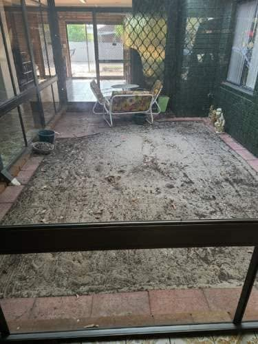 Thornlie internal courtyard — before, bare sand